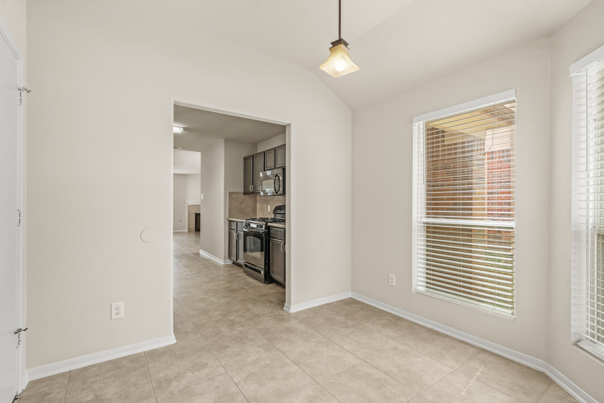 3118 Winchester Rnch Trail Katy, TX 77493 - Photo 18 of 36 an empty room with windows