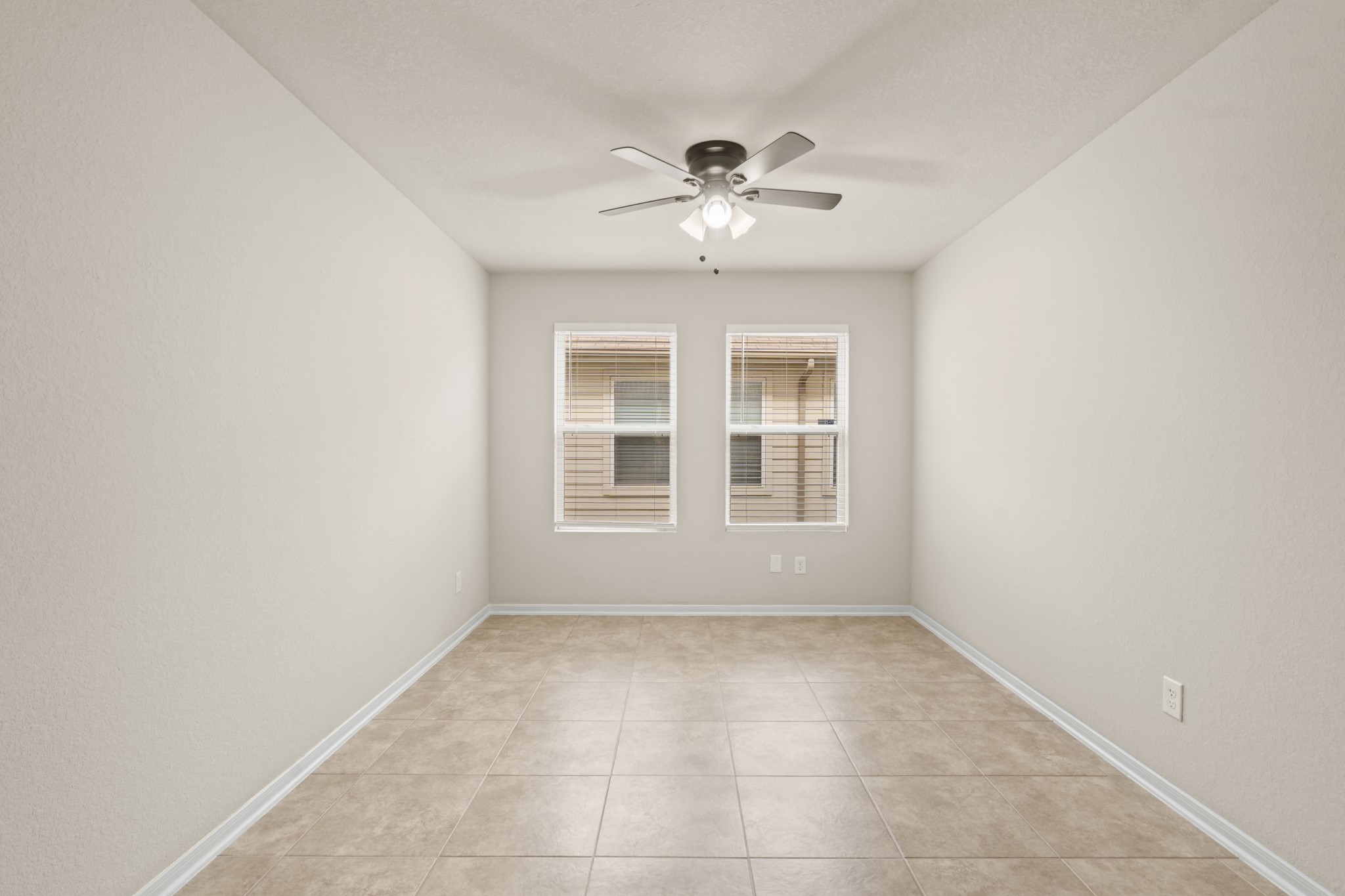 3118 Winchester Rnch Trail Katy, TX 77493 - Photo 21 of 36 a view of an empty room with a window