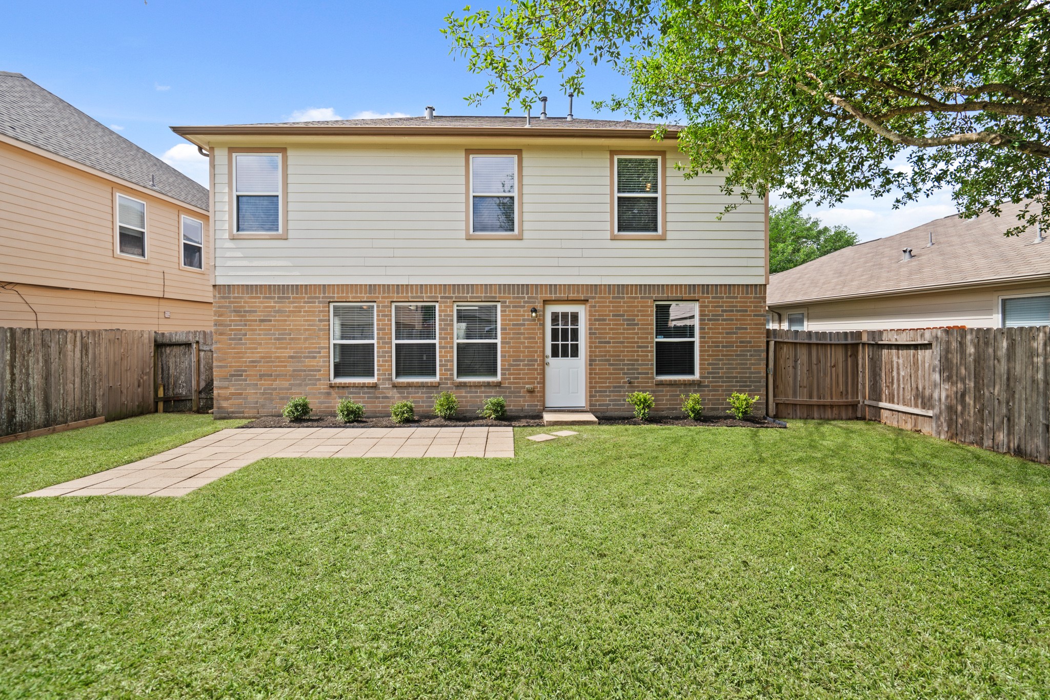 3118 Winchester Rnch Trail Katy, TX 77493 - Photo 5 of 36 a front view of a house with a yard and garage