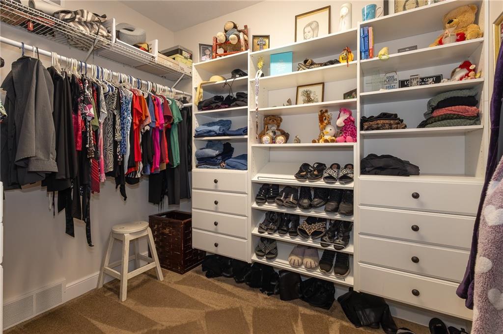 130 Parker Road Mercer, PA 16137 - Photo 24 of 50 a view of walk in closet with clothes and shoes