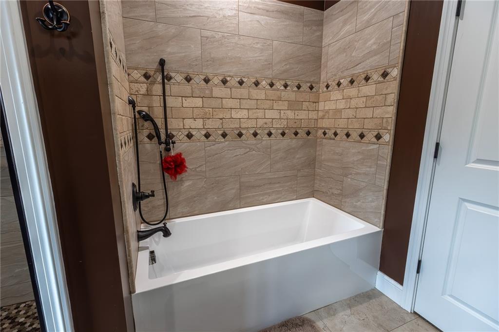130 Parker Road Mercer, PA 16137 - Photo 27 of 50 a bathroom with a bathtub