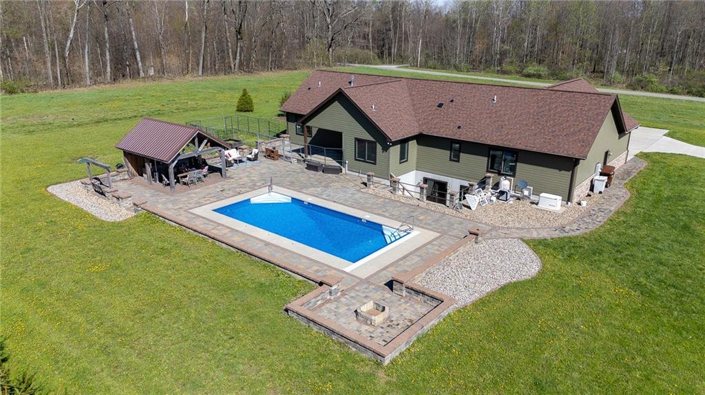 130 Parker Road Mercer, PA 16137 - Photo 50 of 50 a view of a house with backyard and a garden