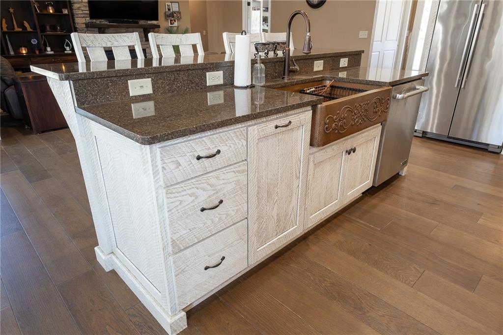 130 Parker Road Mercer, PA 16137 - Photo 8 of 50 a kitchen with stainless steel appliances granite countertop a sink and a refrigerator