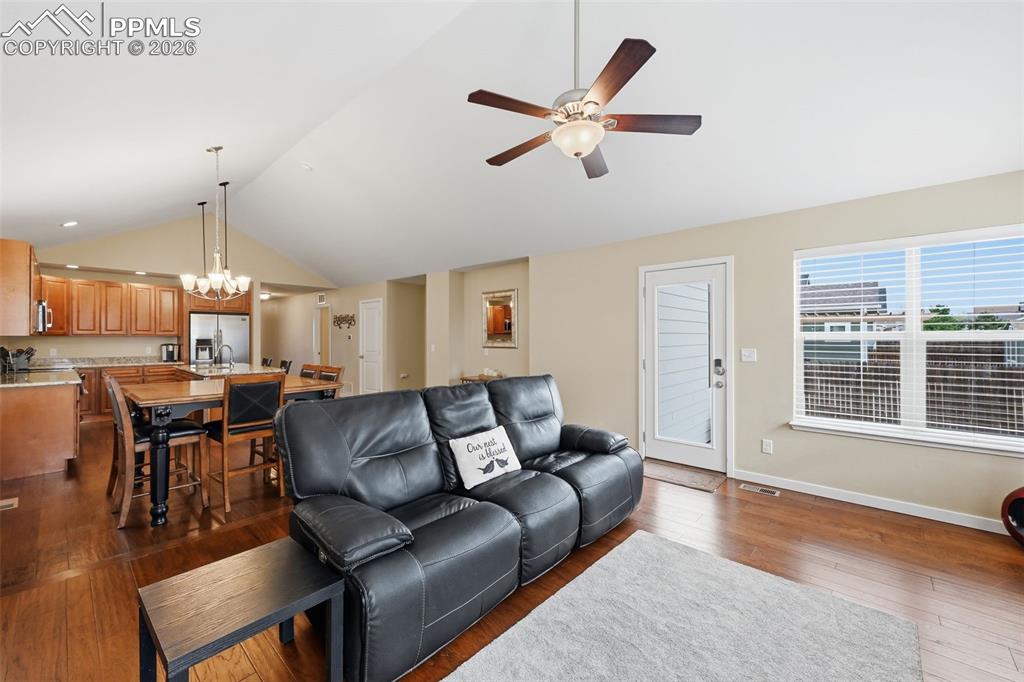 6565 Watusi Road Peyton, CO 80831 - Photo 15 of 36 a living room with furniture and a large window