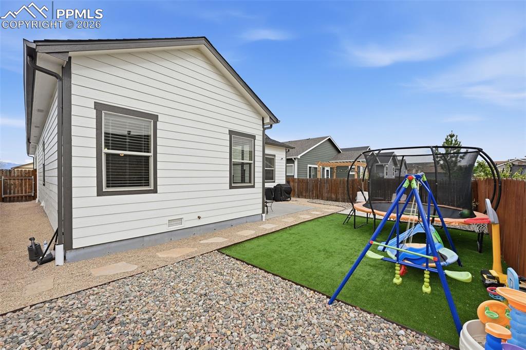 6565 Watusi Road Peyton, CO 80831 - Photo 31 of 36 a view of small space in a backyard