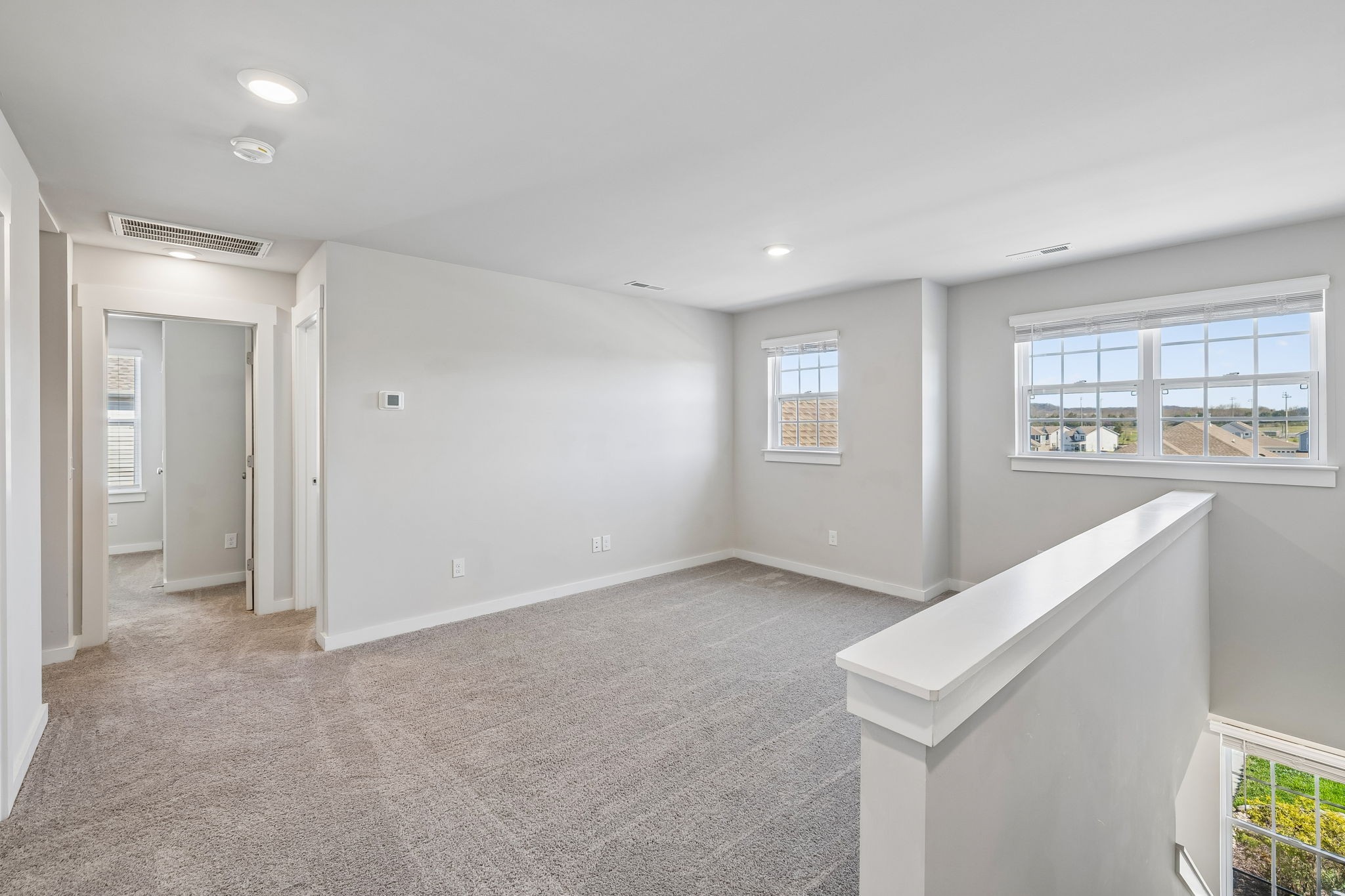 167 Harvest Point Boulevard Spring Hill, TN 37174 - Photo 36 of 55 a view of an empty room with a window