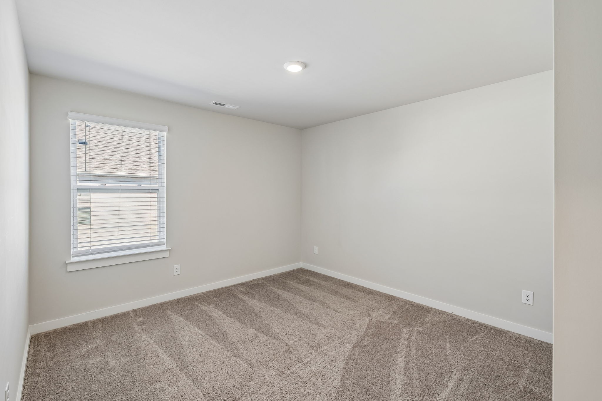 167 Harvest Point Boulevard Spring Hill, TN 37174 - Photo 42 of 55 an empty room with windows