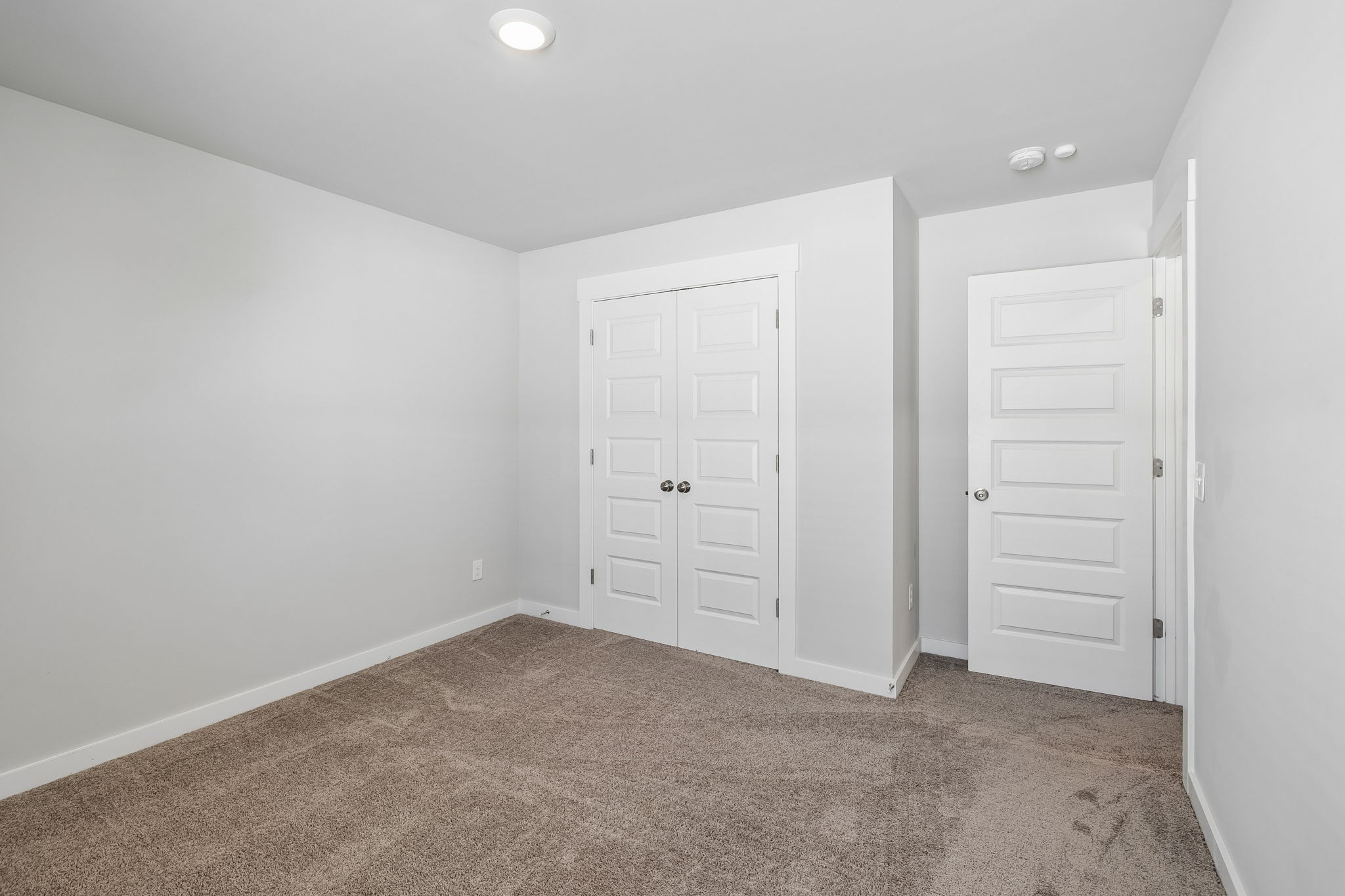 167 Harvest Point Boulevard Spring Hill, TN 37174 - Photo 43 of 55 an empty room with closet area