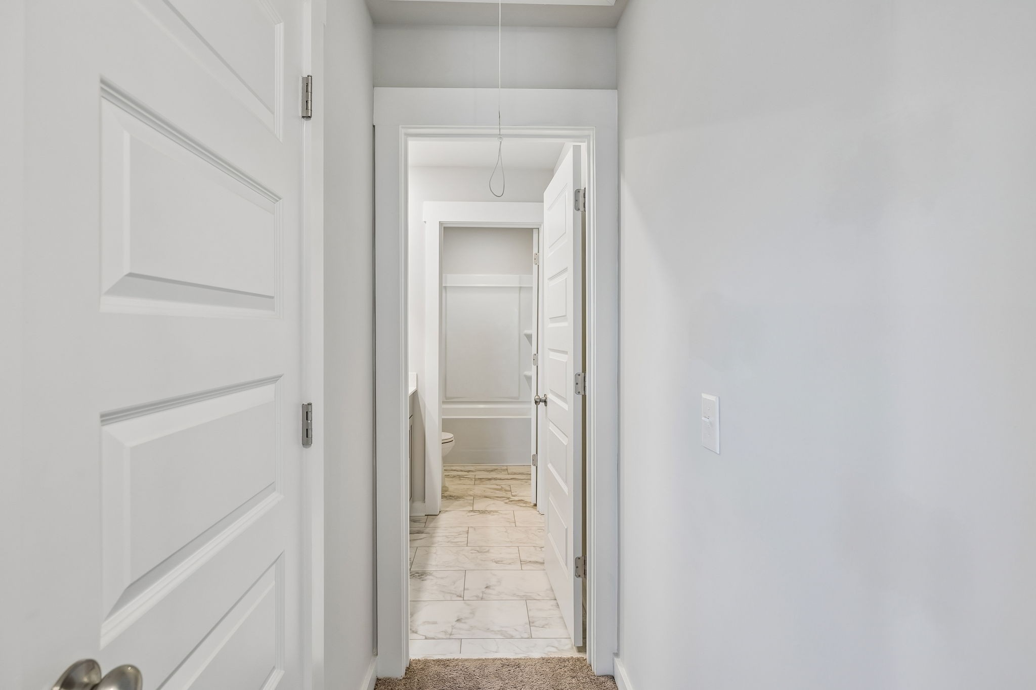 167 Harvest Point Boulevard Spring Hill, TN 37174 - Photo 44 of 55 a view of a bathroom from a hallway
