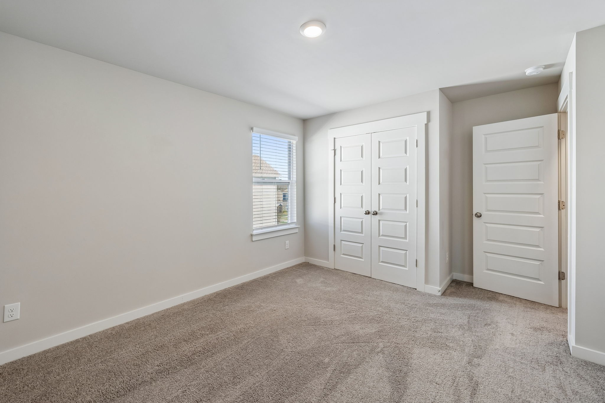 167 Harvest Point Boulevard Spring Hill, TN 37174 - Photo 48 of 55 an empty room with closet area