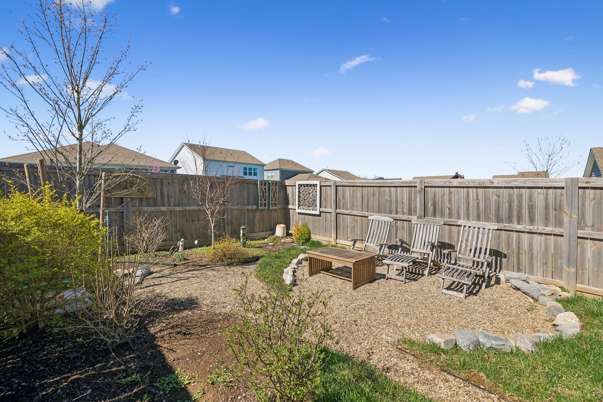 167 Harvest Point Boulevard Spring Hill, TN 37174 - Photo 51 of 55 a view of a backyard with sitting area