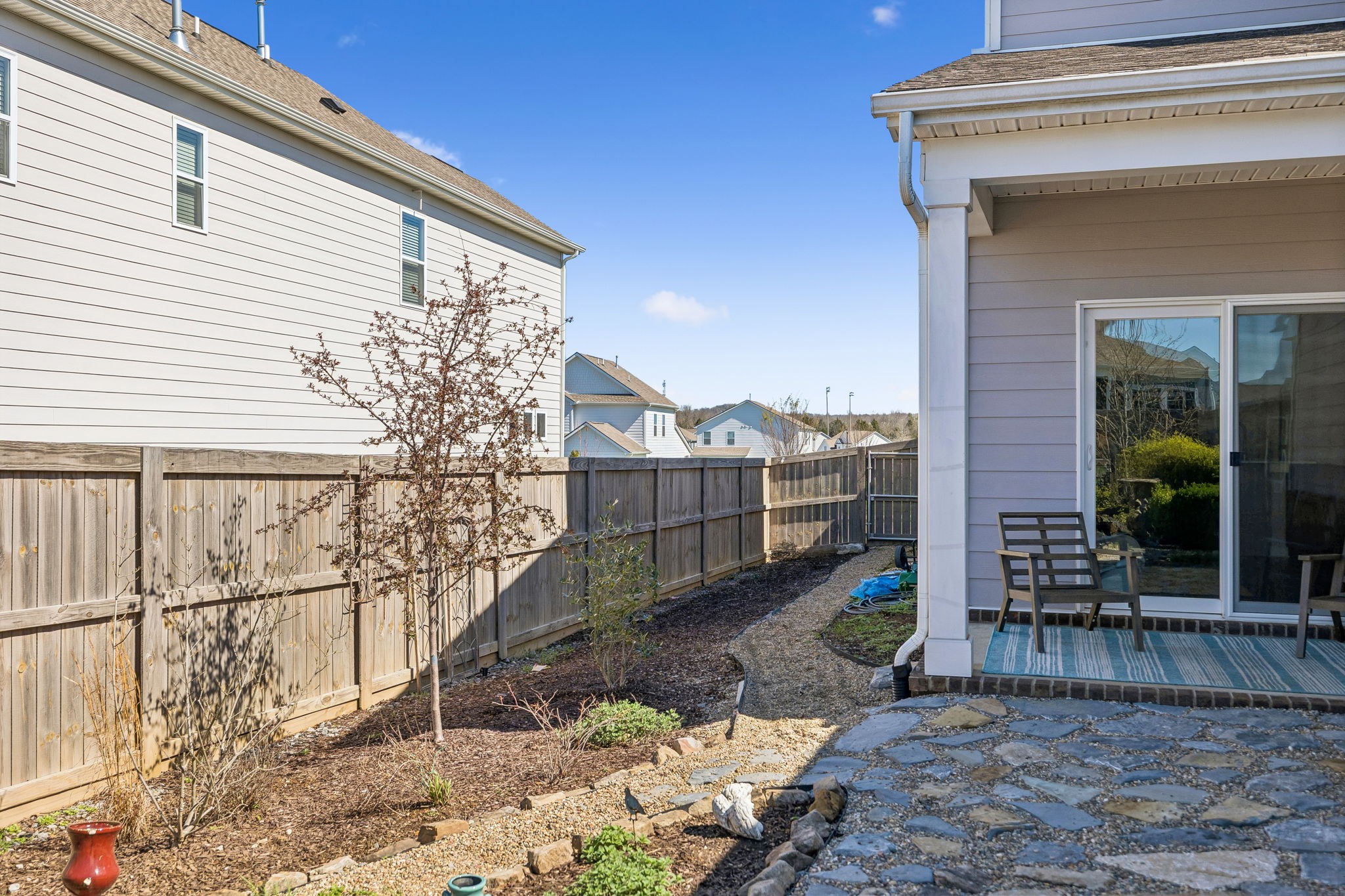 167 Harvest Point Boulevard Spring Hill, TN 37174 - Photo 52 of 55 a backyard of a house