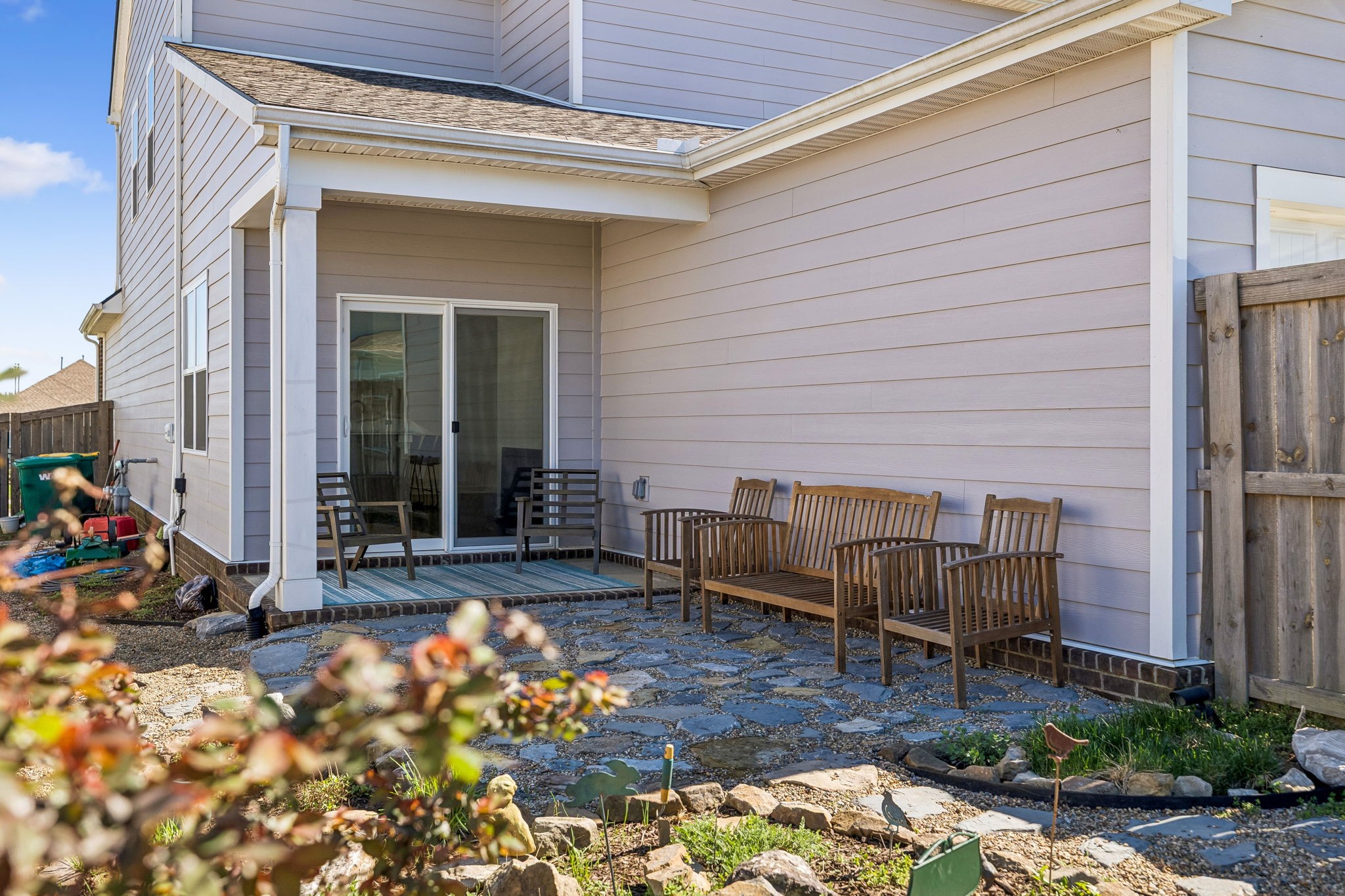 167 Harvest Point Boulevard Spring Hill, TN 37174 - Photo 54 of 55 a backyard of a house with seating space