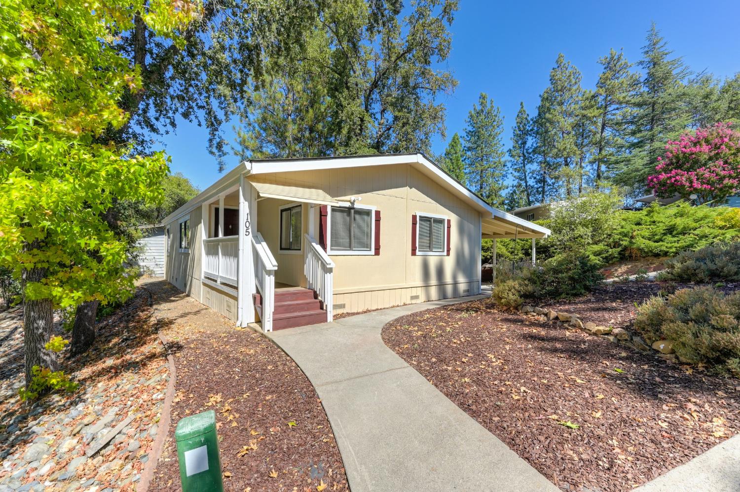 4420 Pleasant Valley Road, Unit 105 Diamond Springs, CA 95619 - Photo 2 of 33 a view of a house with a yard