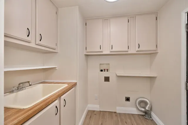 a view of cabinets and sink