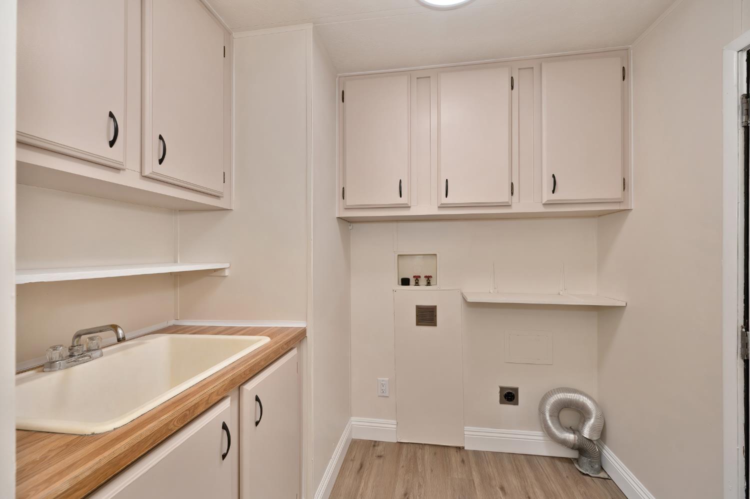 4420 Pleasant Valley Road, Unit 105 Diamond Springs, CA 95619 - Photo 26 of 33 a view of cabinets and sink