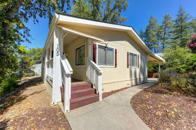 a front view of a house with a porch