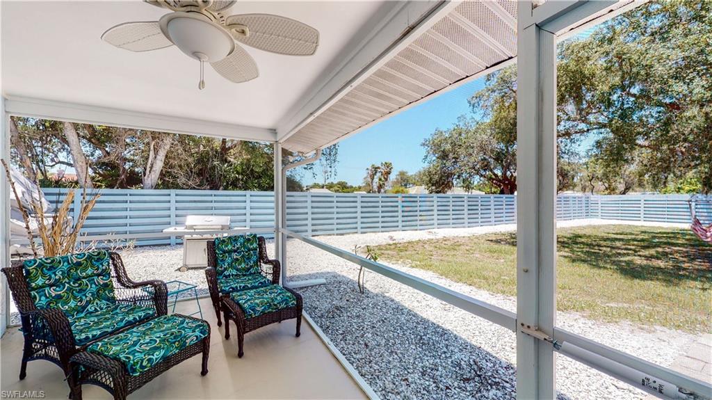 509 Shore Road Nokomis, FL 34275 - Photo 23 of 50 a view of a two chairs in the balcony