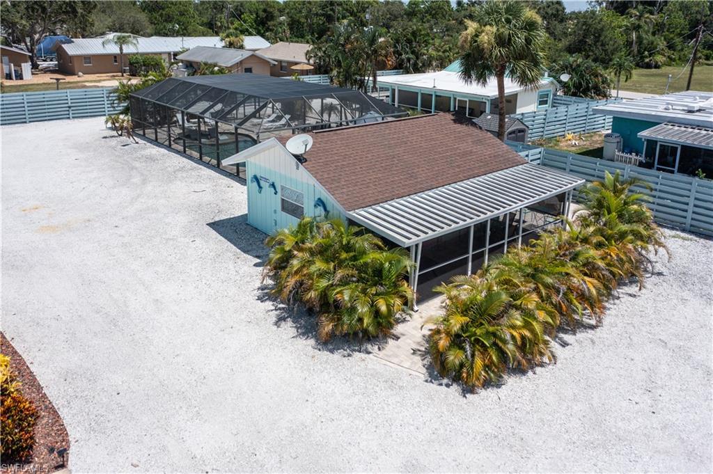 509 Shore Road Nokomis, FL 34275 - Photo 5 of 50 a view of a house with roof and sitting area