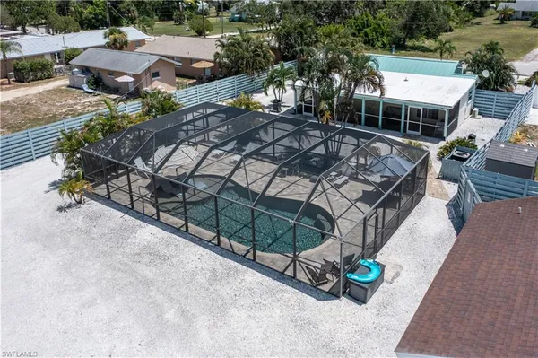 an aerial view of a house with a garden