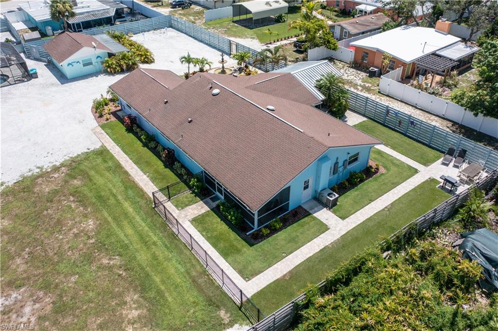 509 Shore Road Nokomis, FL 34275 - Photo 7 of 50 an aerial view of a house with a garden