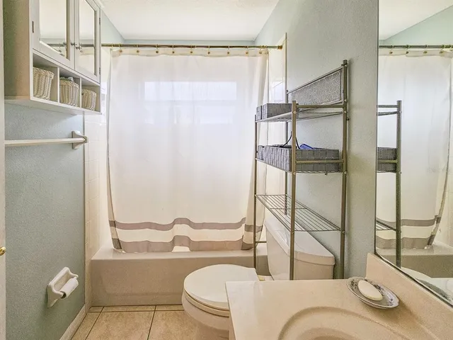 a living room with a couch and a table