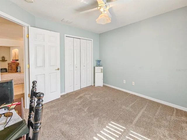a view of a livingroom with a workspace