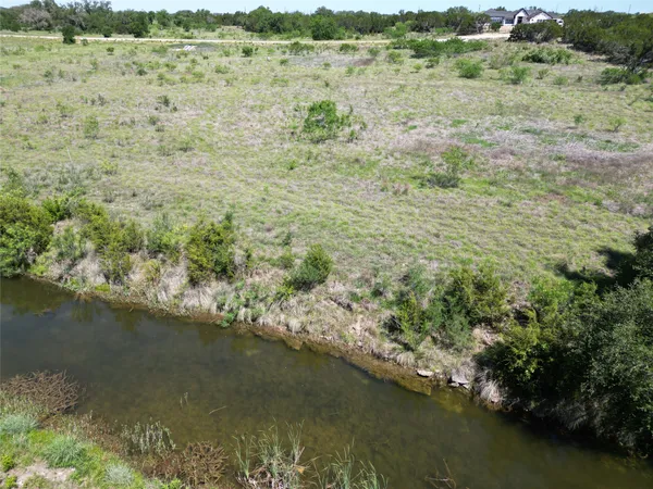 a view of lake with mountain