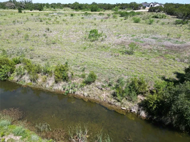 a view of lake with mountain