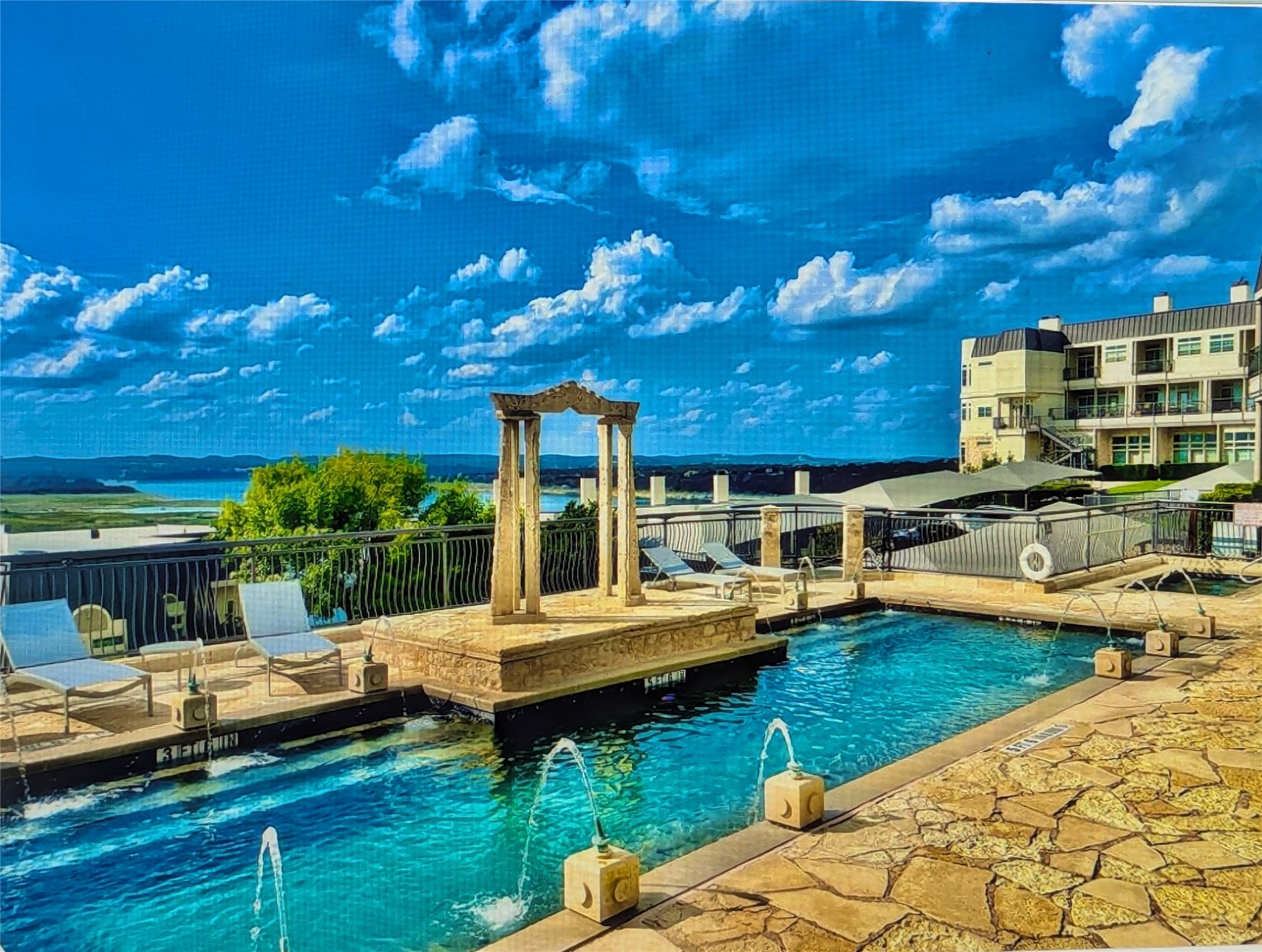 2918 Ranch Road 620 North, Unit Y194 Austin, TX 78734 - Photo 2 of 35 a view of a swimming pool with lounge chairs in patio
