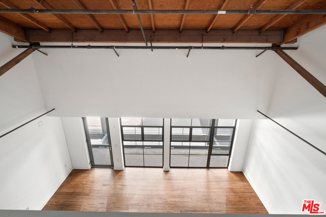 1046 Princeton Drive, Unit 210 Venice, CA 90292 - Photo 23 of 37 a view of entryway with wooden floor