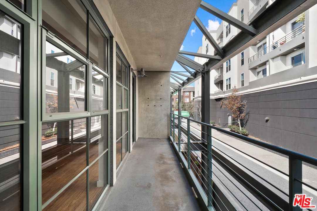 1046 Princeton Drive, Unit 210 Venice, CA 90292 - Photo 24 of 37 a view of a building from a balcony