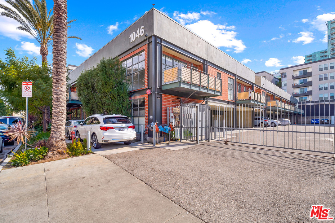 1046 Princeton Drive, Unit 210 Venice, CA 90292 - Photo 31 of 37 a car parked in front of a building