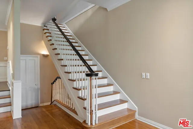 a living room with furniture fireplace and flat screen tv