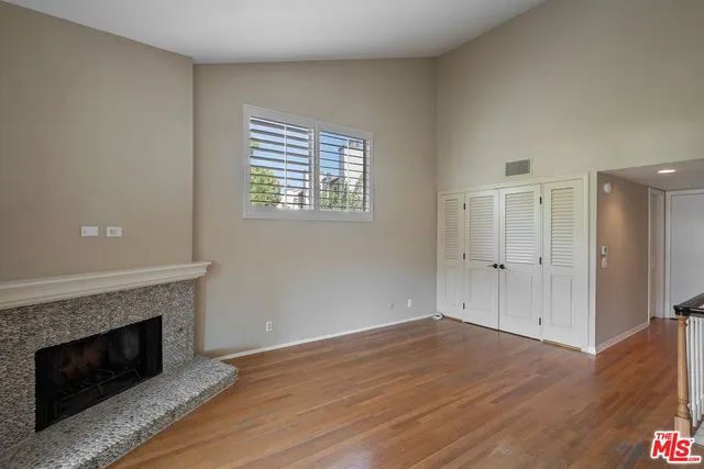 a view of living room with furniture and a flat screen tv