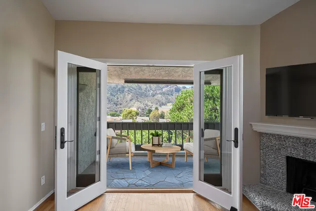 a view of a balcony with an outdoor space