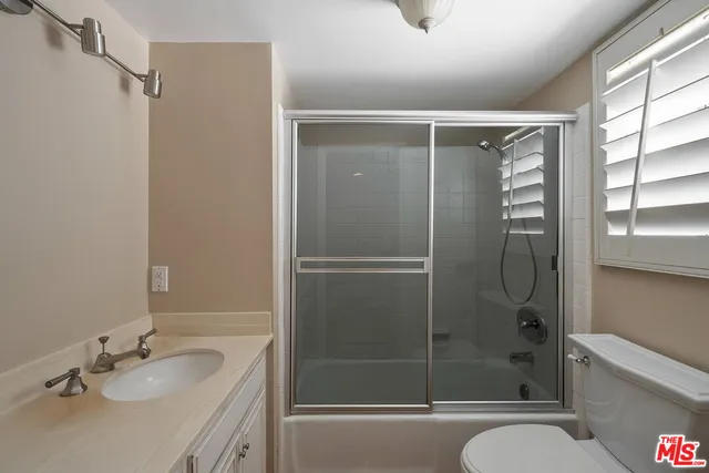 a view of a chairs and table in the patio