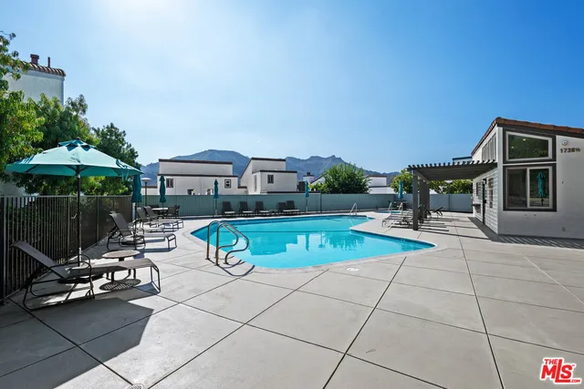 a view of room with wooden floor