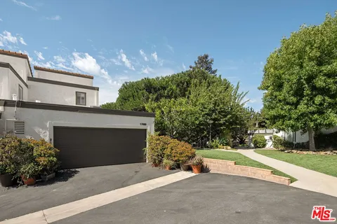 a view of entryway with wooden floor and stairs