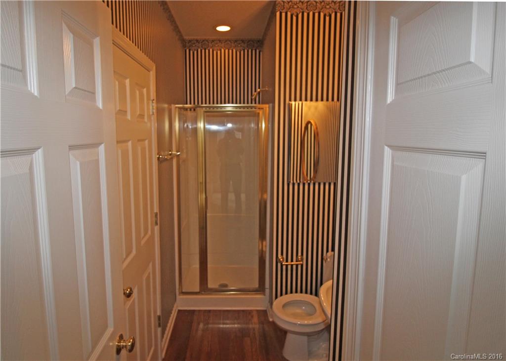 7300 Reedy Creek Road, Unit 59 Charlotte, NC 28215 - Photo 12 of 24 a view of a bathroom with wooden floor