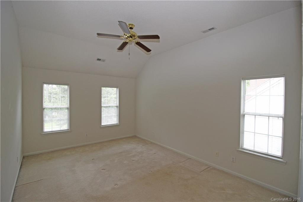 7300 Reedy Creek Road, Unit 59 Charlotte, NC 28215 - Photo 17 of 24 a view of empty room with windows