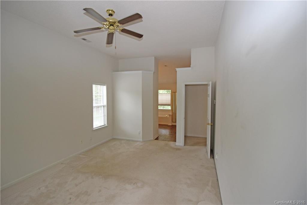 7300 Reedy Creek Road, Unit 59 Charlotte, NC 28215 - Photo 18 of 24 a view of an empty room with a window