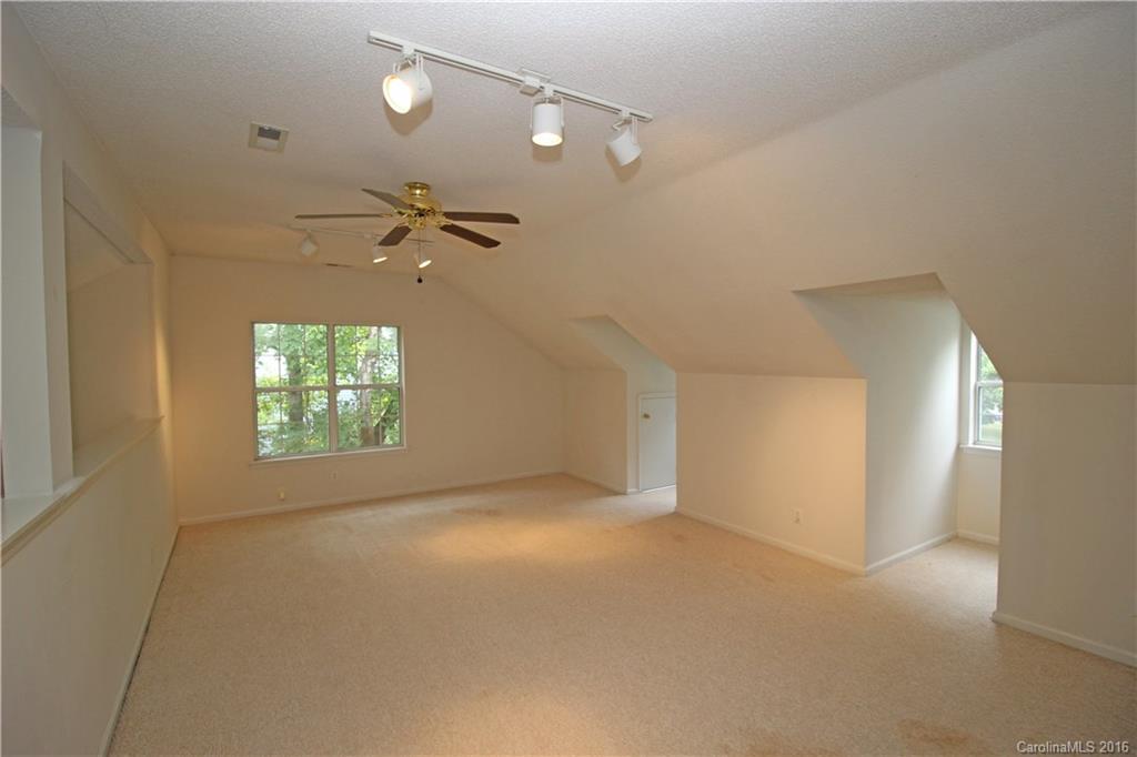 7300 Reedy Creek Road, Unit 59 Charlotte, NC 28215 - Photo 21 of 24 a view of an empty room with a window