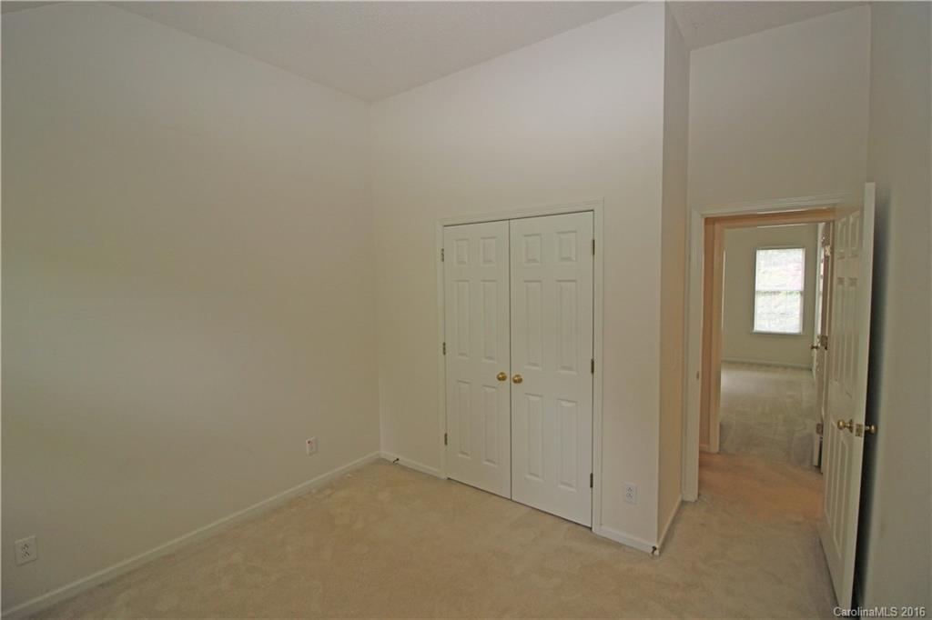 7300 Reedy Creek Road, Unit 59 Charlotte, NC 28215 - Photo 22 of 24 an empty room with closet area