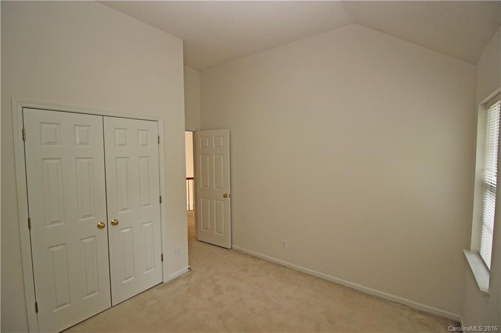 7300 Reedy Creek Road, Unit 59 Charlotte, NC 28215 - Photo 23 of 24 a view of an empty room