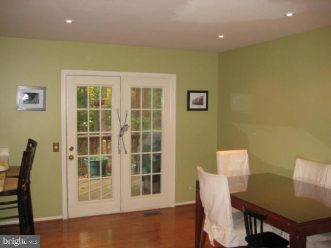 110 Finale Terrace Silver Spring, MD 20901 - Photo 3 of 7 a view of a dining room with furniture and front door