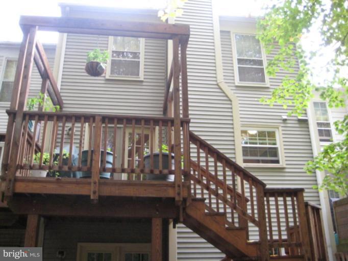 110 Finale Terrace Silver Spring, MD 20901 - Photo 5 of 7 a front view of a house with a porch