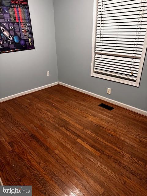 27520 Tatum Road Unionville, VA 22567 - Photo 5 of 9 a view of a room with wooden floor and a window