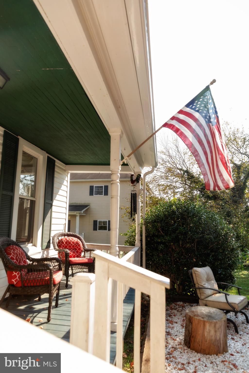 302 South Hammonds Ferry Road Linthicum Heights, MD 21090 - Photo 23 of 29 a front view of a house with outdoor seating