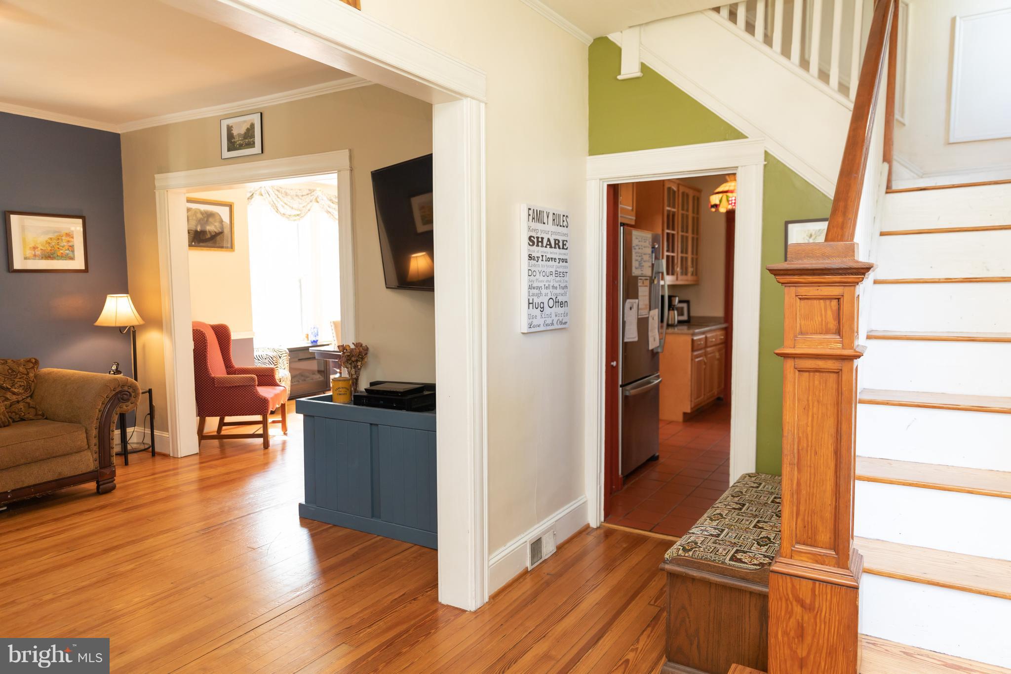 302 South Hammonds Ferry Road Linthicum Heights, MD 21090 - Photo 6 of 29 a view of living room with furniture and wooden floor